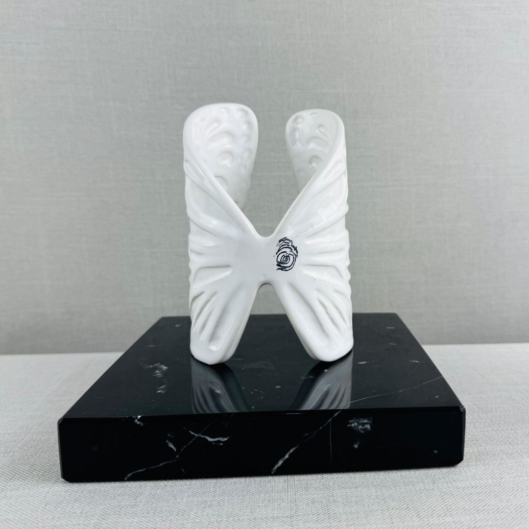 Mariposa-base-simple-marmol-negro